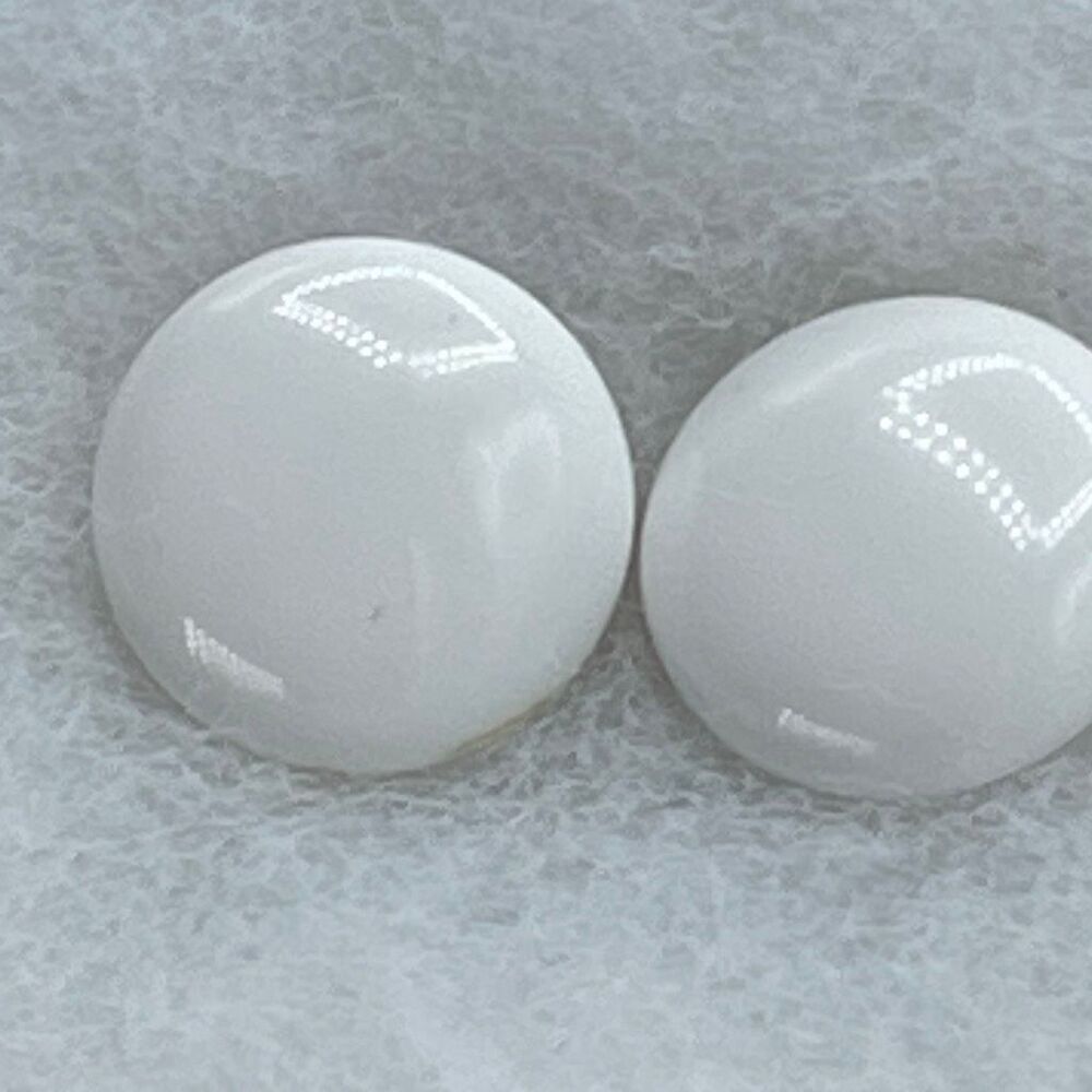 Vintage Trifari White enamel round button style earrings.